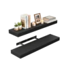 Expertly crafted black floating shelves featuring a sleek matte finish, recognized as some of the best shelves for displaying Valentine's Day gifts and greenery with minimalist elegance.