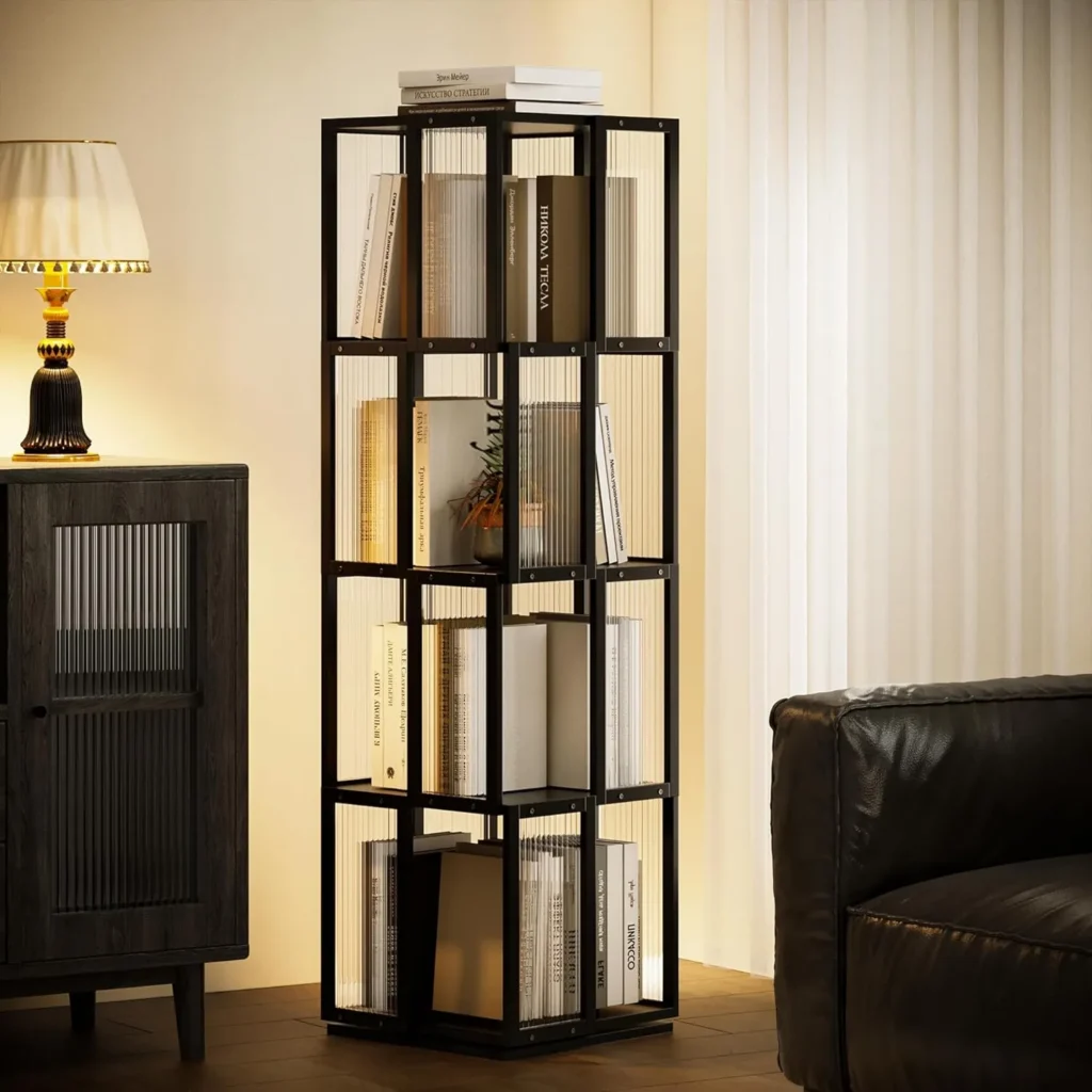 A black 4-tier rotating shelf styled in a minimalist living room between a modern cabinet and sofa, creating a calm and orderly atmosphere through thoughtful, functional design.