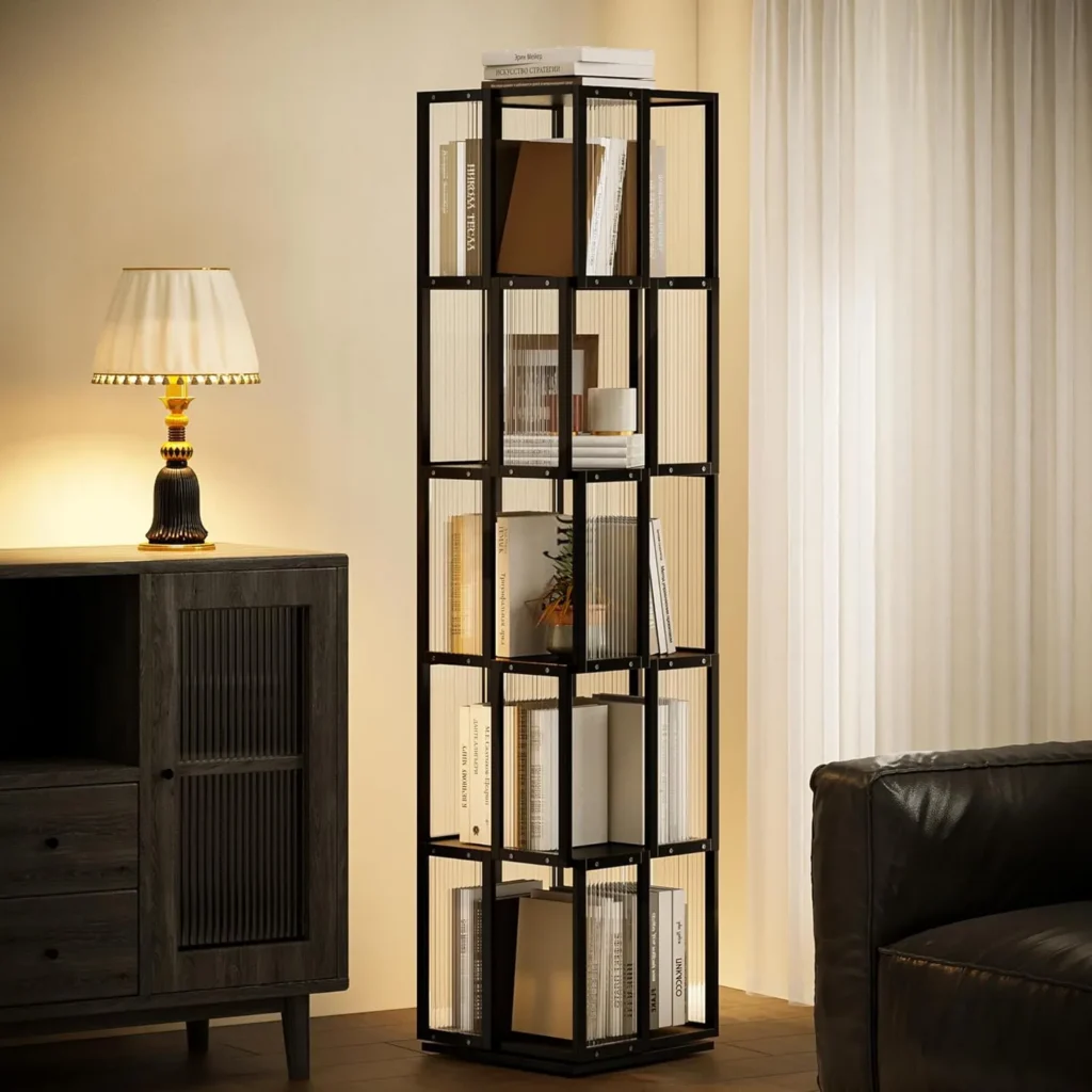 A sleek 5-tier black rotating bookshelf placed in a modern living space with a lamp and sofa, showcasing how BAMEOS furniture balances traditional craftsmanship with a contemporary, clean lifestyle.
