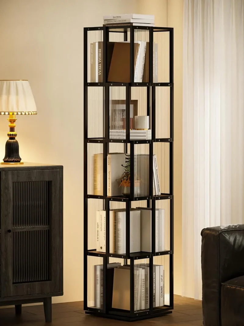 A sleek 5-tier black rotating bookshelf placed in a modern living space with a lamp and sofa, showcasing how BAMEOS furniture balances traditional craftsmanship with a contemporary, clean lifestyle.